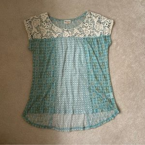 Girl’s lace and patterned blouse